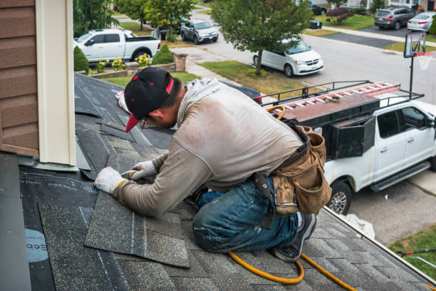 Professional Roof Replacement technician working in Shelbyville, MI